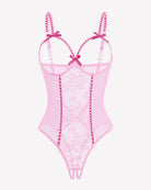 Crotchless lace mini teddy bodysuit in pink with sheer mesh and lace-up straps