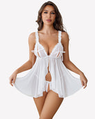 White sheer mesh babydoll with lace trim, open-front ruffle skirt, and matching thong