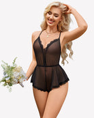 Black mesh cami romper with lace V neckline and ruffled lace-trim shorts