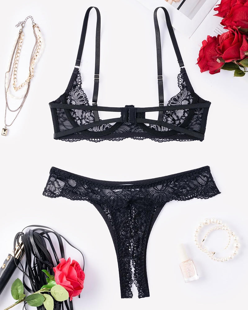 Black lace underwire push-up bra and matching thong set with crisscross straps