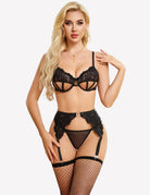 Black lace cut-out bra and panty with garter straps and fishnet stockings, full outfit