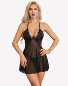 Black lace babydoll dress with sheer mesh skirt and V-neck lace bodice