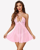 Pink lace babydoll dress with sheer mesh skirt and crisscross halter neckline