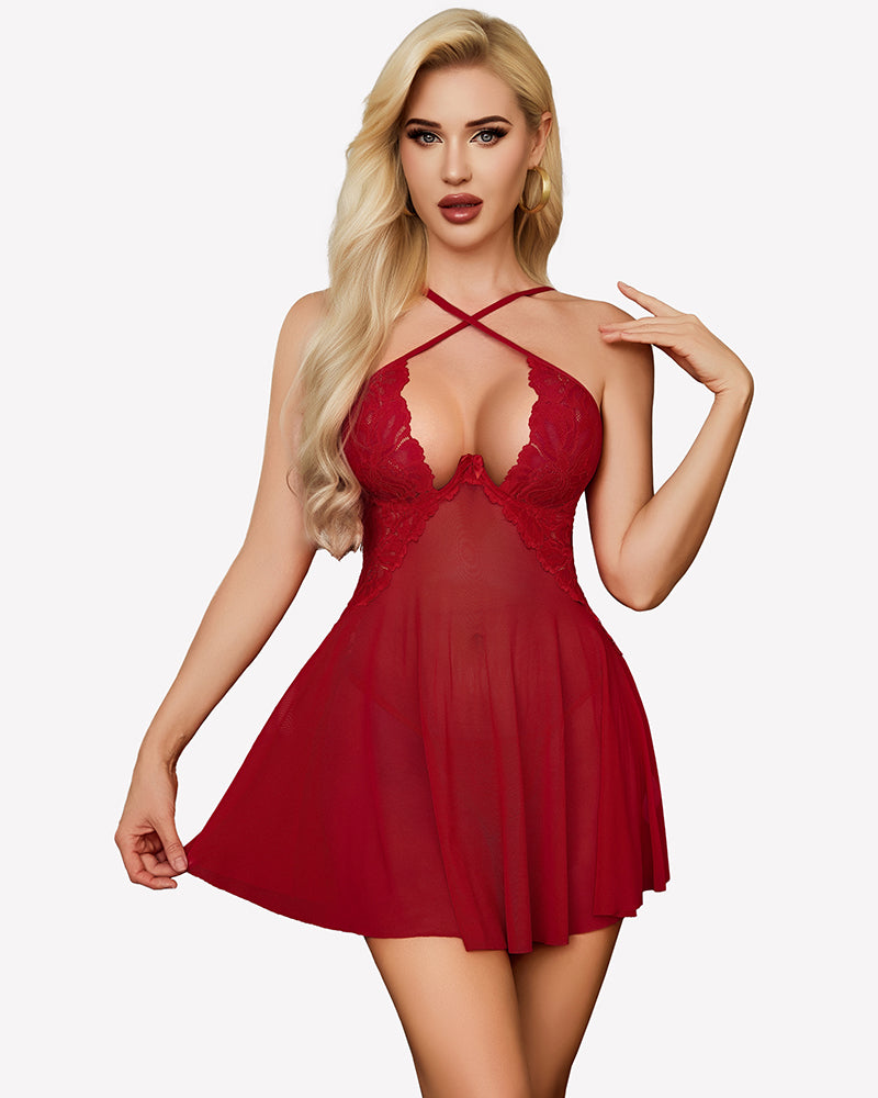 Red lace babydoll dress with crisscross halter straps and sheer flared mesh skirt