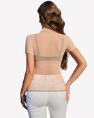 Light tan sheer mesh top, short sleeves, open back panel.