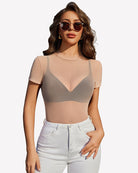 Light tan sheer mesh top with V-shaped yoke, short sleeves.