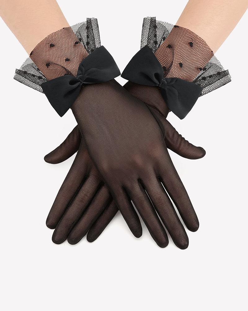 Black mesh short gloves with polka-dot accents and oversized bow ties at wrist