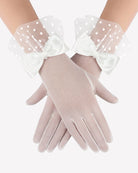White mesh short gloves with polka-dot overlay and white bow ties at wrist