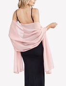 Light pink sheer chiffon shawl scarf wrap with flowing drape and gathered twist at shoulder