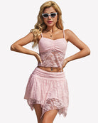 Lace crop top and mini skirt set in light pink with ruched bust and layered hem