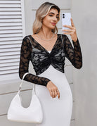 Black floral lace crop cover-up with V-neck front knot and long sleeves