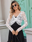 White floral lace crop cover-up with V-neck front knot and long sleeves