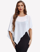 Sheer chiffon capelet with batwing sleeves, draped asymmetric hem over dark dress