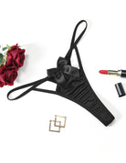Satin bow low-rise thong, black, hollow-out sides and satin ribbon bow at front
