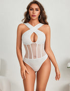 White sequin mesh bodysuit with crisscross straps and center cutout