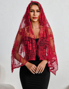 Dark red lace mantilla veil with scalloped edge draped over head