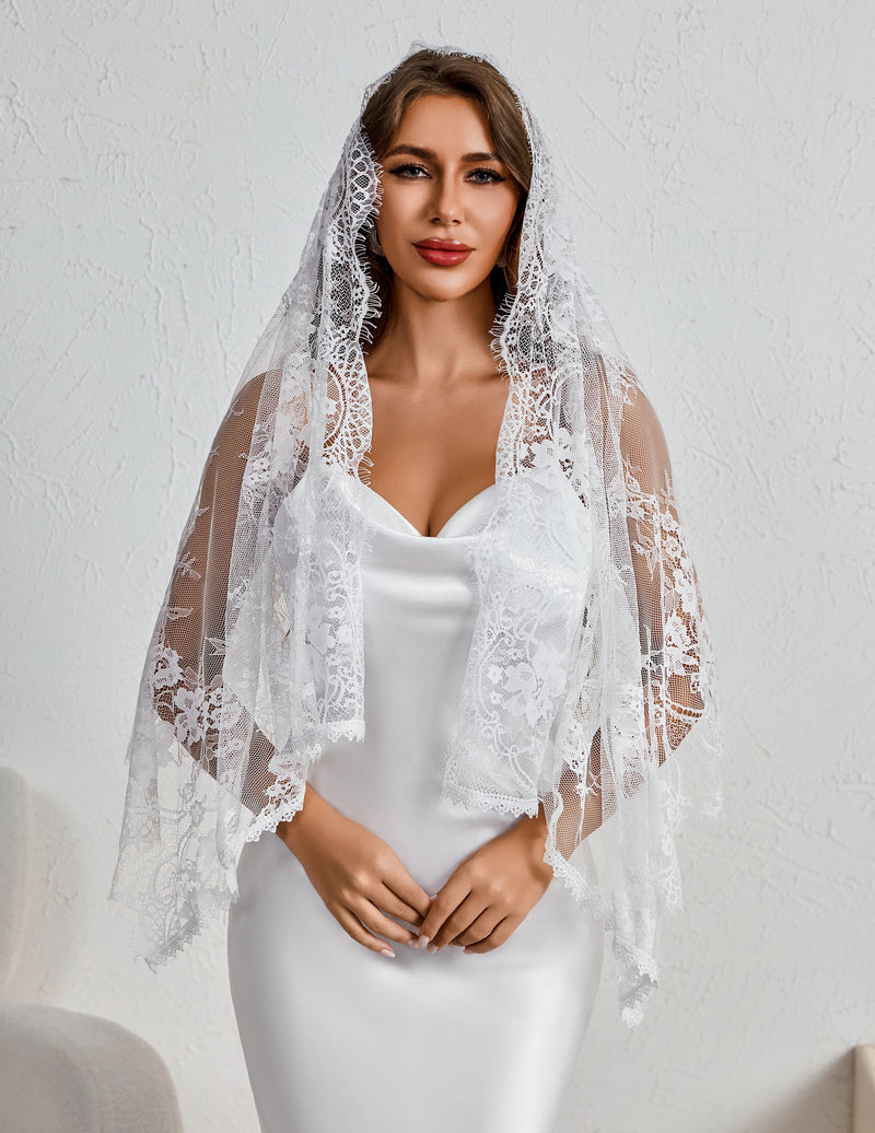 White lace mantilla veil with scalloped edge and floral lace trim.