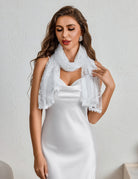 White lace mantilla veil with scalloped edge and floral lace front drape.