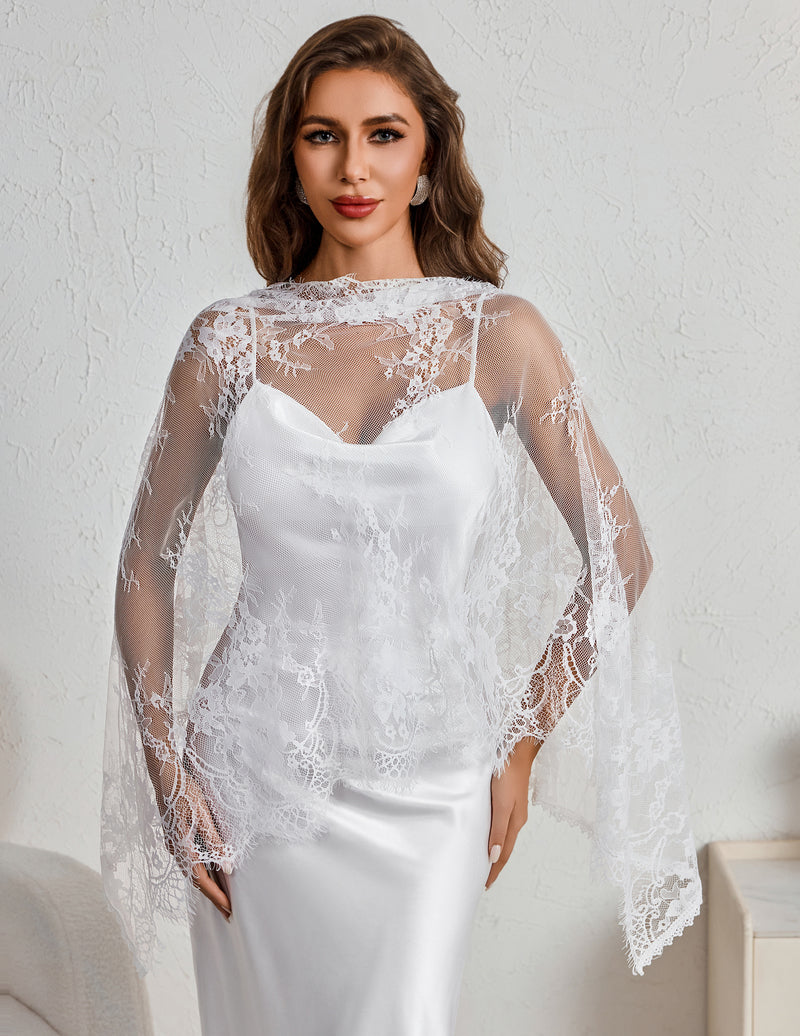 White lace mantilla veil with scalloped edge, draped over shoulders