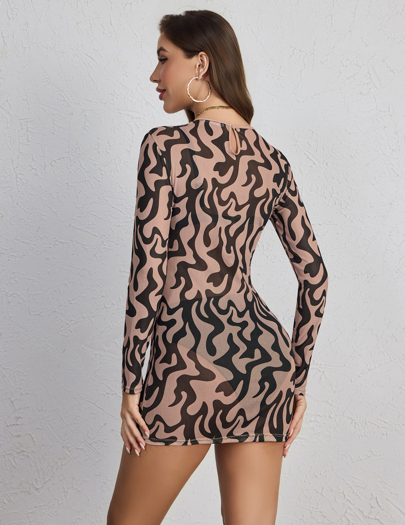 Brown and black abstract leopard mini dress with long sleeves, back view
