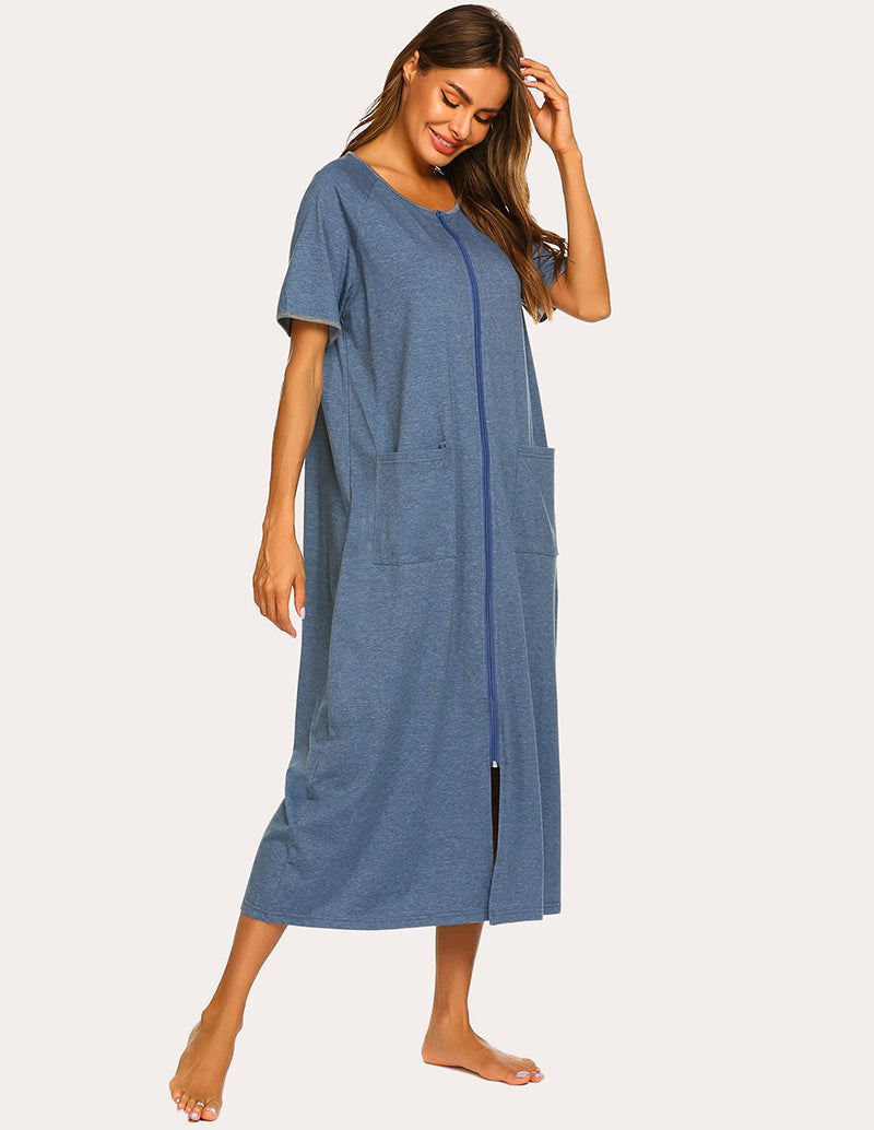 Blue short-sleeve loungewear dress with zipper front, side pockets, and long draped skirt