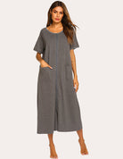 Light grey short-sleeve loungewear dress with front zipper and side pockets, full length