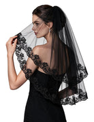 Black tulle wedding veil with lace floral trim, layered fingertip length