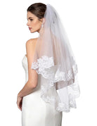 White tulle wedding veil with lace floral trim, layered fingertip length