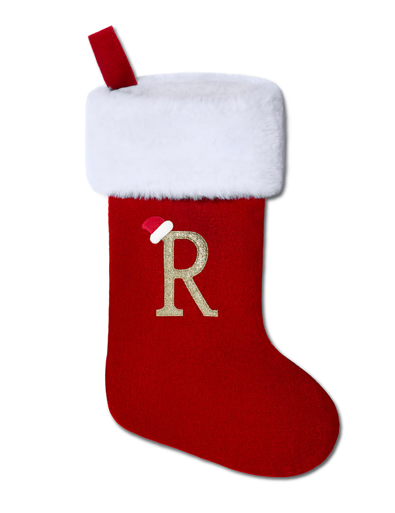 Front view of a red velvet Christmas stocking with white plush cuff, hanging loop, and gold R.