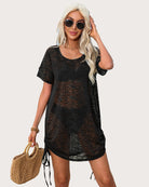 Blue lace cover-up dress with adjustable side ties, perfect for beach outings.