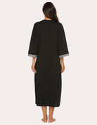 Back view of black 3/4-sleeve zip front nightgown robe with gray sleeve cuffs.