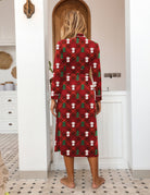 Full-length knit bathrobe in red plaid with snowman and tree pattern, back view