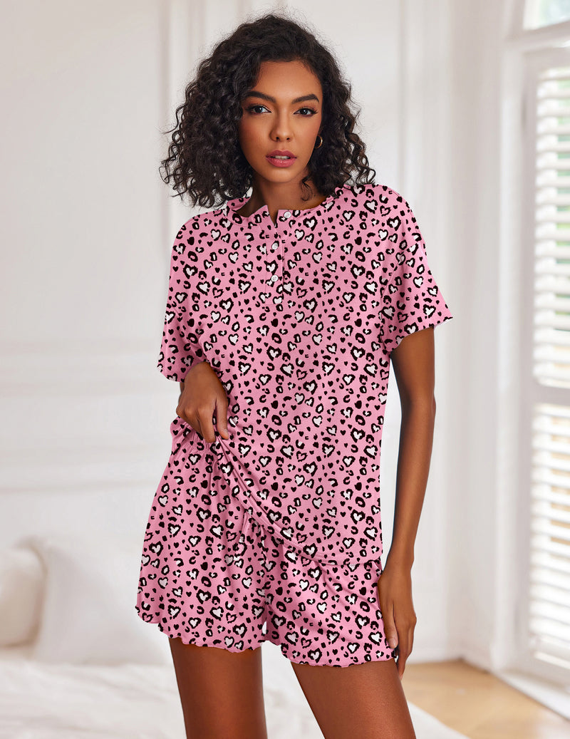 Women's pink leopard-print short-sleeve pajama set with button top and drawstring shorts