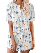 Women's white floral short-sleeve pajama set with button top and drawstring shorts