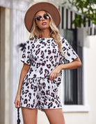 White and dark leopard print short-sleeve pajama set with elastic-waist shorts