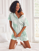 Women’s mint pajama set with short-sleeve button top and matching shorts, soft tie-dye pattern