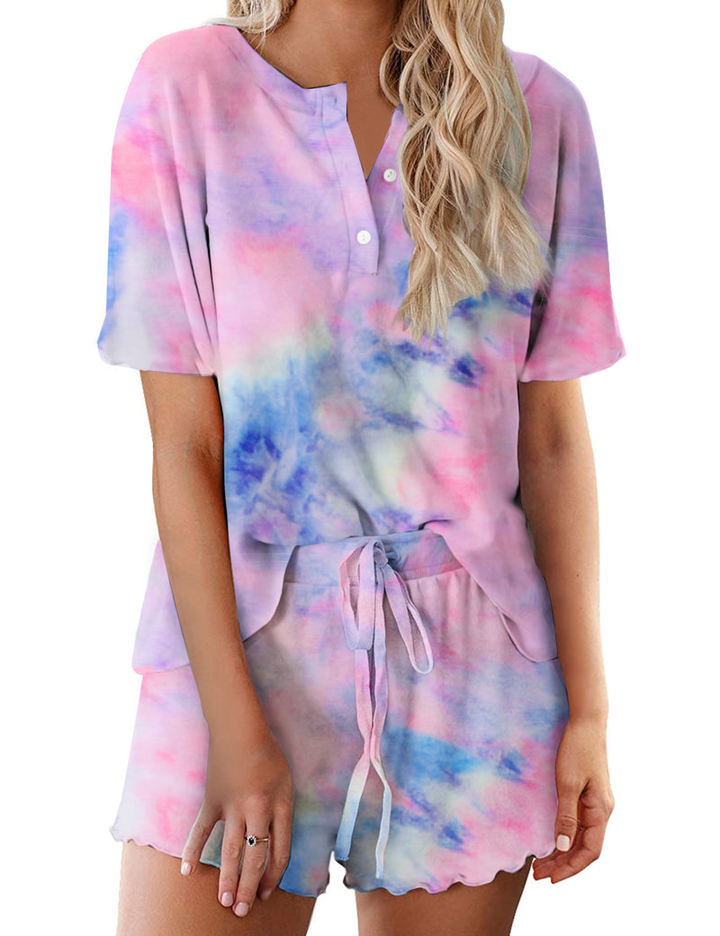 Women’s tie-dye pajama set in pink, blue, and purple; short-sleeve button top with drawstring shorts