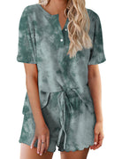 Women’s green tie-dye pajama set with short-sleeve button-up top and matching drawstring shorts