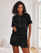 Women's black star-print short-sleeve pajama set with button top and drawstring shorts