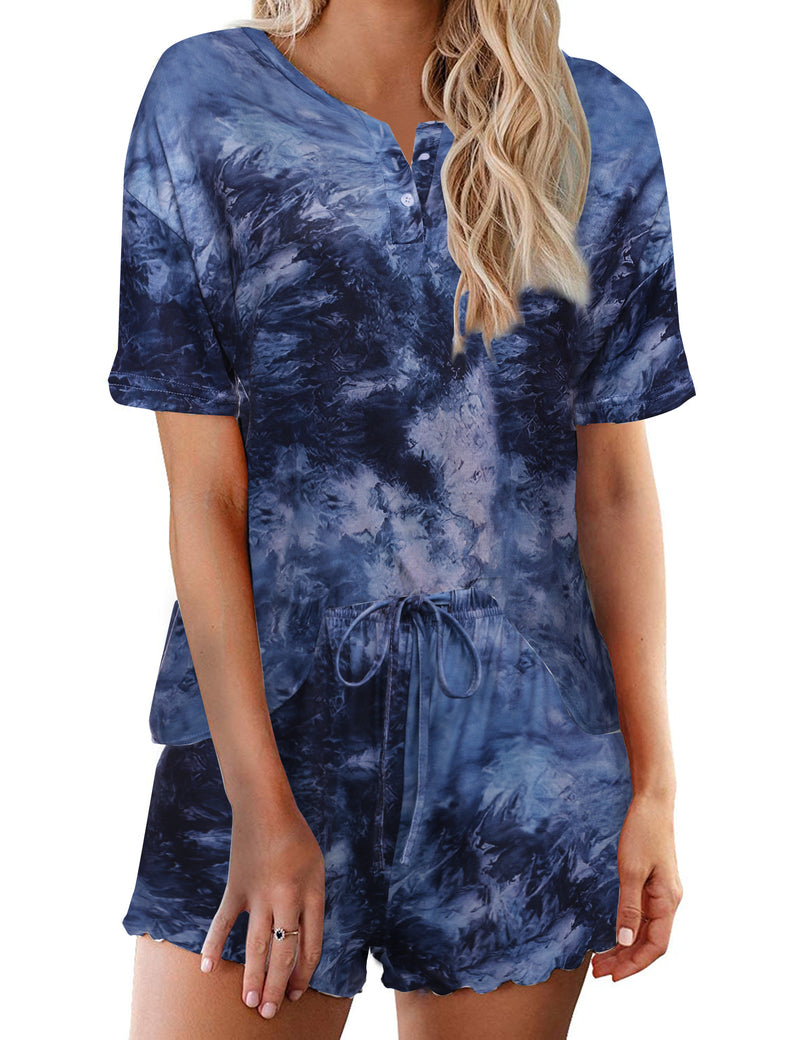 Women’s tie-dye pajama set in deep blue; short-sleeve button henley top with matching drawstring shorts