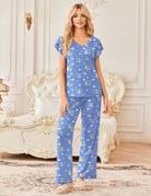Blue short-sleeve pajama top and wide-leg pants with light bear icon print