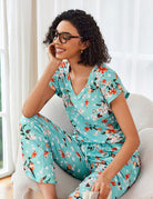 Turquoise floral pajama set with V-neck short sleeves and ruched drawstring pants