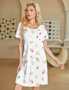 White short sleeve ruffle nightgown with floral print and chest pocket.