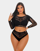 Black fishnet long sleeve two-piece lingerie set highlighting lace patterns and curves.