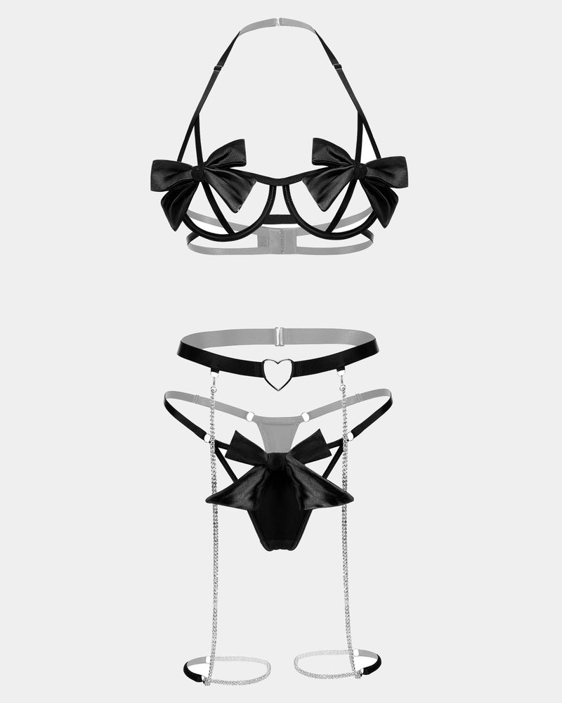 Black bow lingerie set with underwire bra, garter belt, heart cutout, chain details, and g-string