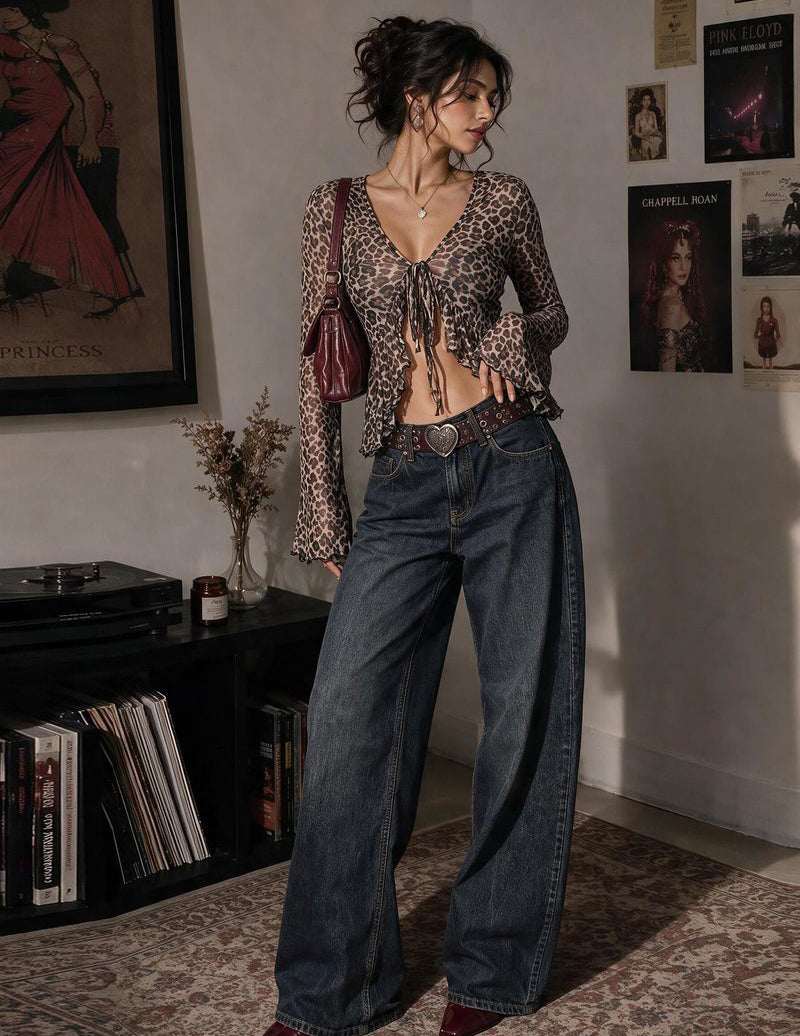 Leopard sheer mesh tie-front shrug with bell sleeves and ruffled hem.