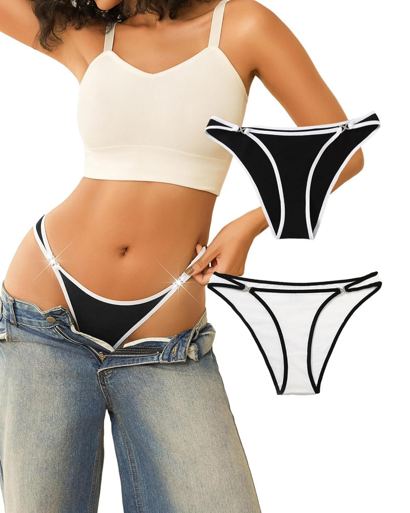 Black low rise thong panty with rhinestone accents, white trim, sensual lingerie, beige crop top.