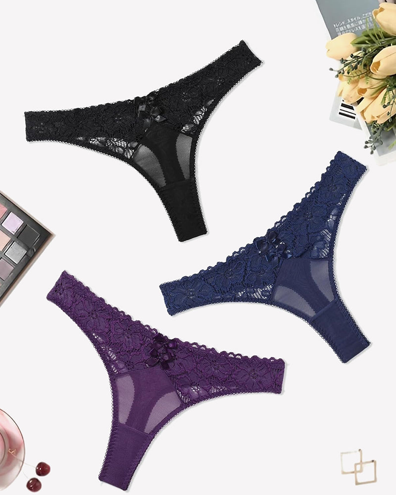 Lace thongs in black, navy blue, and purple. Low waist cheeky panties with bow details.