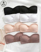 Set of strapless bandeau tops with buckle front in black, white, nude, and brown