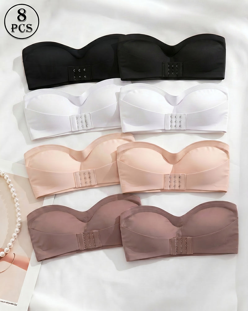 Set of strapless bandeau tops with buckle front in black, white, nude, and brown